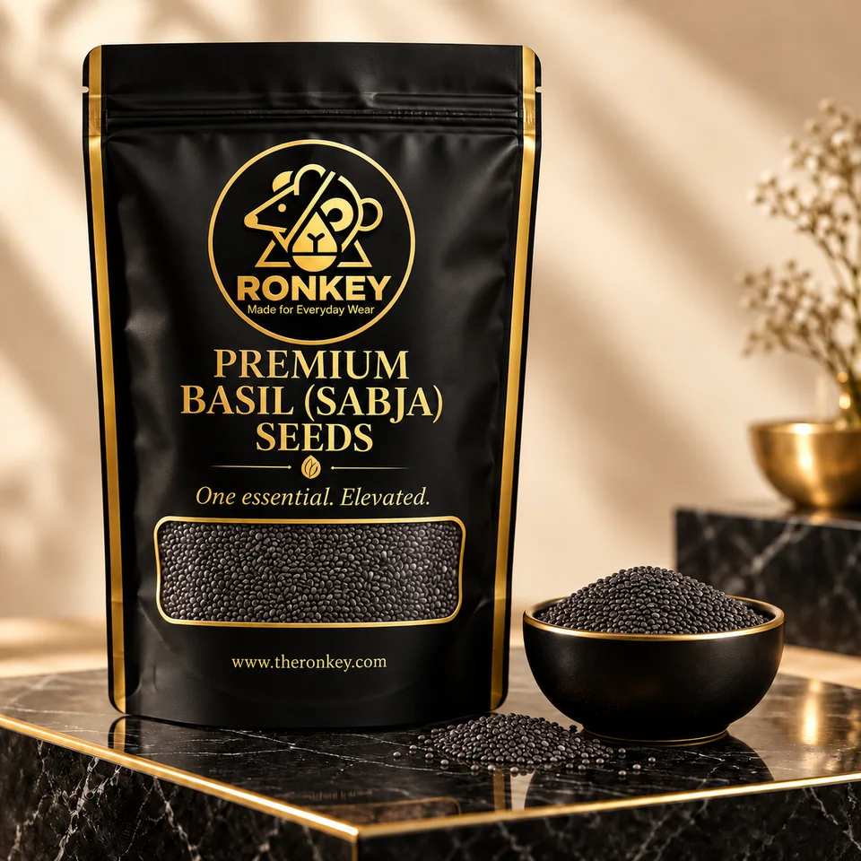 RONKEY Premium Basil (Sabja) Seeds in a matte-black RONKEY pouch with a clear seed window. — representative concept visual