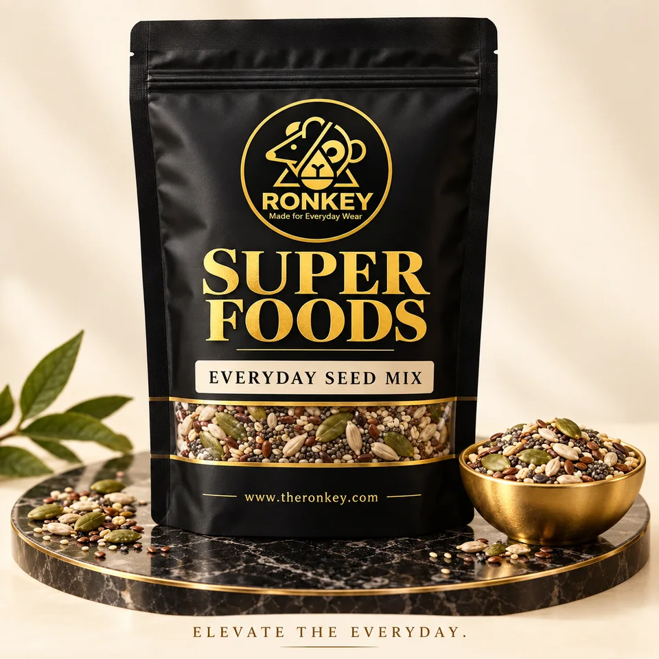 RONKEY SUPER FOODS Everyday Seed Mix luxury black-and-gold package with visible mixed seeds. — representative concept visual